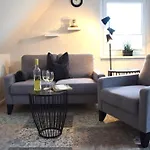 Haus Triton Апартаменты Бюзум