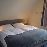 Haus Triton Апартаменты Бюзум