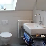 Апартаменты Haus Triton Бюзум
